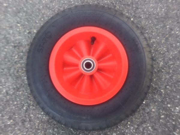 Wiel met rode kunstof velg
